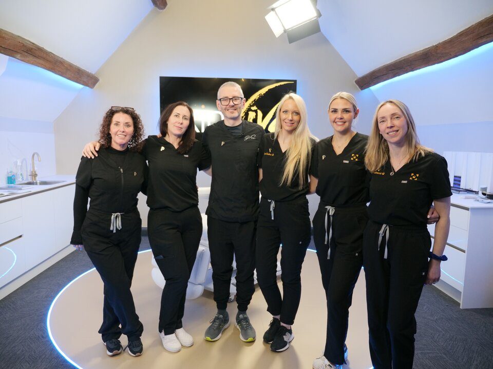 Dr Tim Pearce with the clinical team